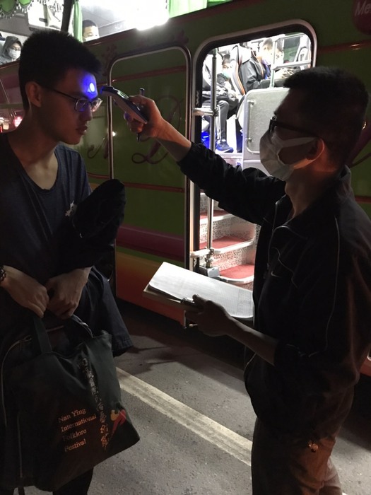 While checking the temperature on school bus, please wear masks and should  check the temperature both entering and leaving the bus.